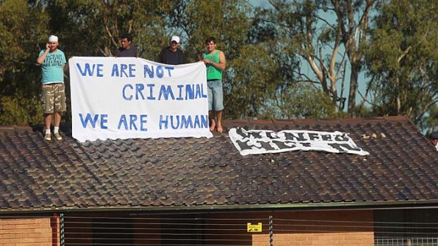 Speaking up ... Protestors from the refugee action coalition at Villawood Detention Centre.