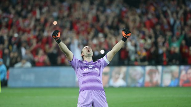 At last... Adelaide United goalkeeper Eugene Galekovic celebrates his side's grand final triumph.