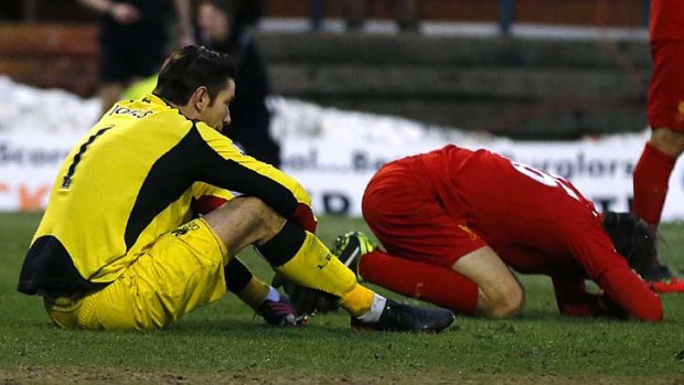 Disconsolate ... Liverpool's Brad Jones, left, and Sebastian Coates react to conceding a second goal during their FA Cup fourth round loss to Oldham Athletic.