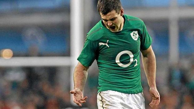 Crucial miss: Jonathan Sexton reacts after missing a penalty kick for Ireland with four minutes to go.