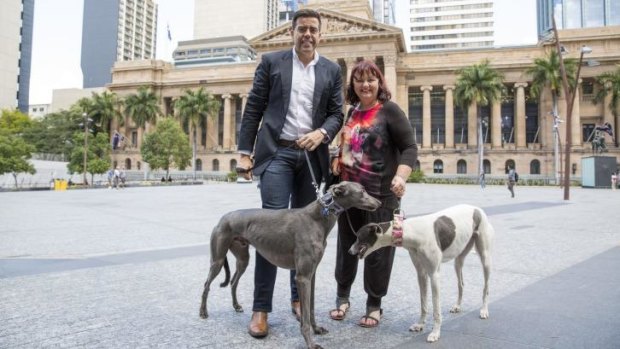 Lisa Paxton and Councillor Milton Dick with two beautiful greyhounds.