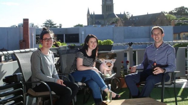 Caitlin Smith (left), Meghan Rogers, and Tim Connors enjoy the inner-city lifestyle in a Bendigo CBD apartment.