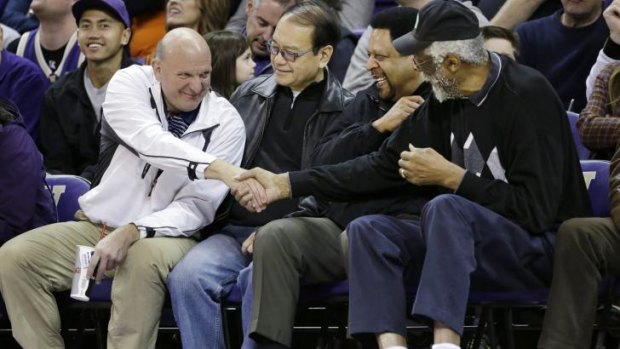 Steve Ballmer, left, pressing the flesh with former NBA players earlier this year.