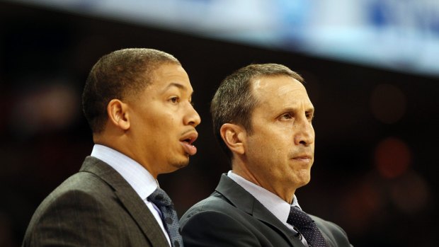 Trading places: New Cleveland Cavaliers coach Tyronn Lue with predecessor David Blatt last month.