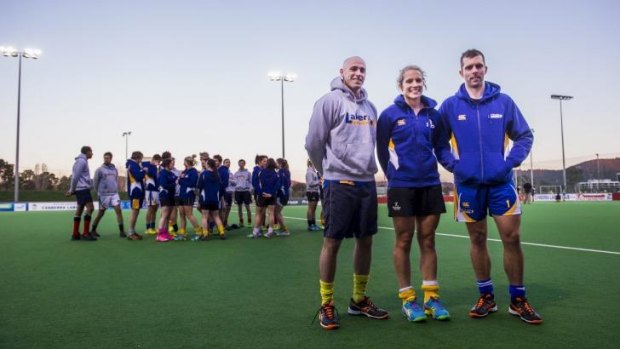 Australian and Canberra representatives Glen Turner, Edwina Bone, and Andrew Charters, with the rest of the Canberra Lakers and Canberra Strikers ahead of their departure to compete in the Australian Hockey League.