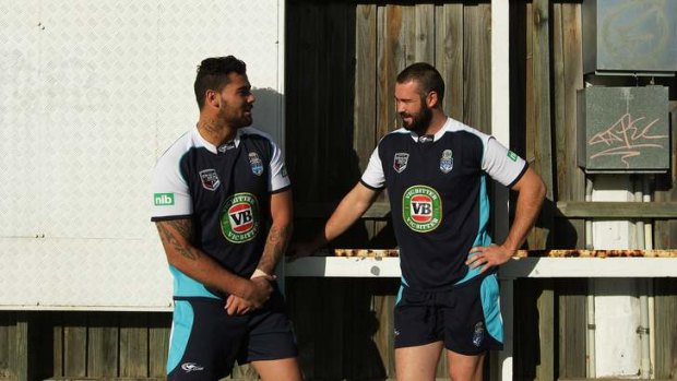 Tight bond: Andrew Fifita and Aaron Woods.
