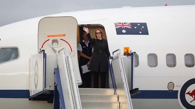 Heading to China: Prime Minister Julia Gillard departs Canberra.