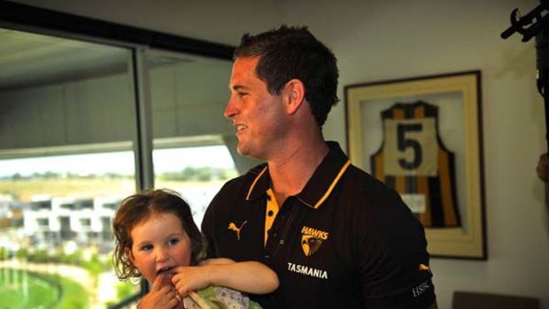 Trent Croad with daughter Kira at Waverly Park after announcing his foot injury has forced him into retirement, Wednesday 6 January 2010.