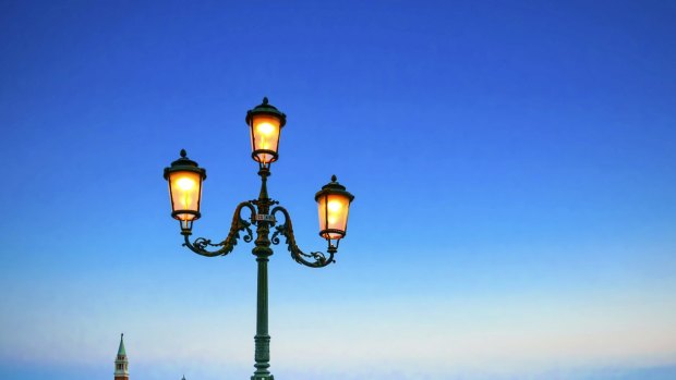 Venice street lamp during twilight.