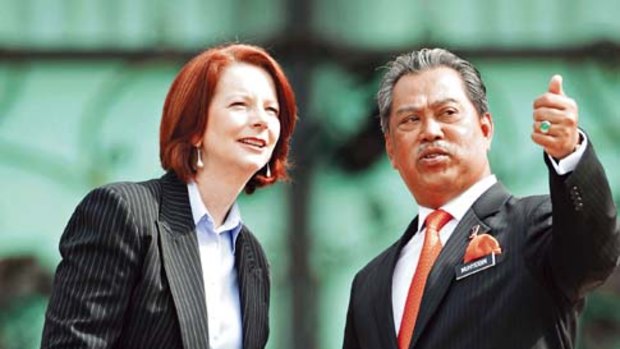 Julia Gillard with Malaysia's Deputy Prime Minister Muhyiddin Yassin on November 1, 2010.