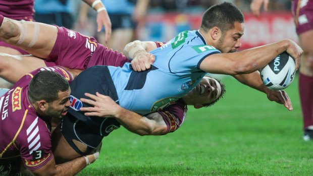 Moving forward: The Blues' Jarryd Hayne dives in for a try.