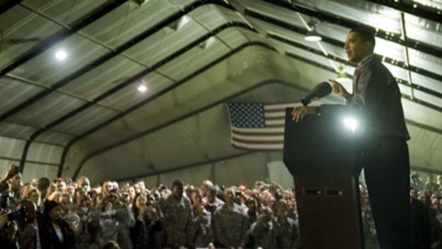First visit ...  Barack Obama addresses troops at Bagram Air Base on Sunday. Mr Obama thanked the Afghan people and US troops for their sacrifices in the war in Afghanistan.