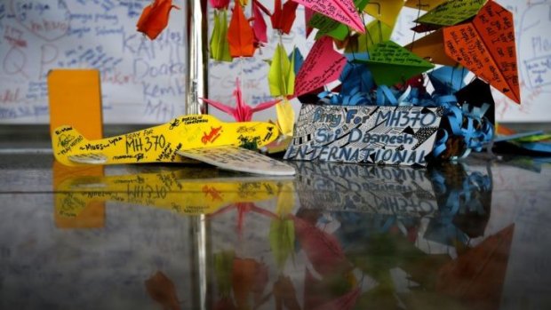 Messages dedicated to people on the missing plane at Kuala Lumpur International Airport.