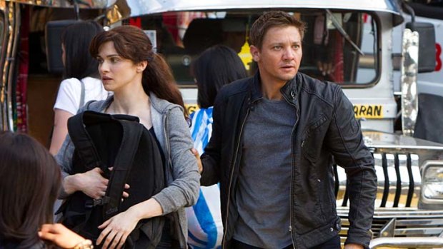 Bourne to run &#8230; CIA operative Aaron Cross (Jeremy Renner) with fellow fugitive Marta (Rachel Weisz).