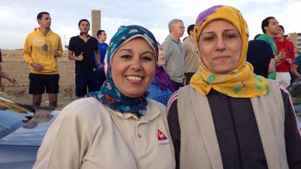 Good time to catch up: Sisters Nazak Saafan and Maha jog together in Cairo.