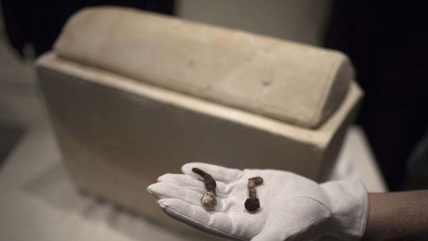 Two Roman nails next to a Roman period ossuary which Simcha Jacobovici   believes may have been used in the crucifixion of Jesus.