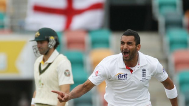 England's Ajmal Shahzad removes middle order batsman Usman Khawaja cheaply.