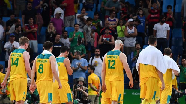 Bad night at the office: the Boomers walk off the court.