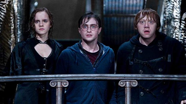 Hermione Granger, Harry Potter and Ron Weasley portrayed by Emma Watson, Daniel Radcliffe and Rupert Grint in <i>Harry Potter and the Deathly Hallows: Part II</i>.
