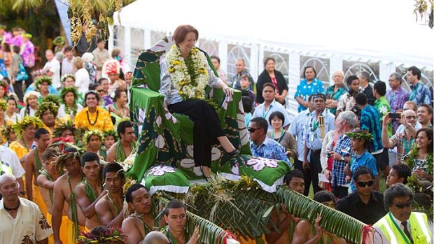 Australian Prime Minister Julia Gillard is welcomed to the the Cook Islands.