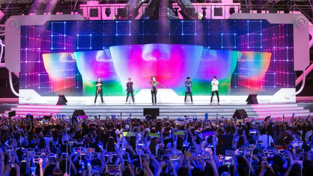 Beneath K-pop's glitzy surface, the connection its performers have with the fans can run deep
