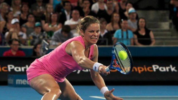 A stretch too far ... Kim Clijsters struggles to get to a shot behind the baseline on her way to a surprise defeat in the Sydney International final.