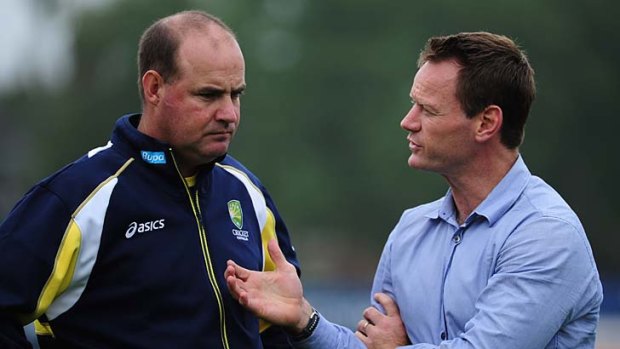 Big call: Mickey Arthur, left, pictured talking to high performance chief Pat Howard in June 2012.