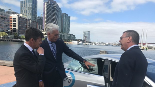 Roads Minister Luke Donnellan, Transurban CEO, Scott Charlton,  and VicRoads boss John Merritt check out a driverless car.