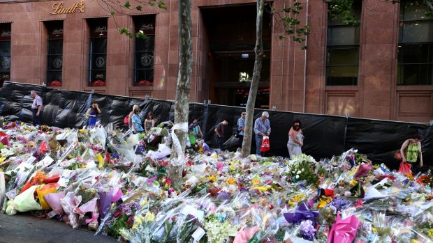 Flowers laid in tribute outside the Lindt Cafe following the fatal siege.
