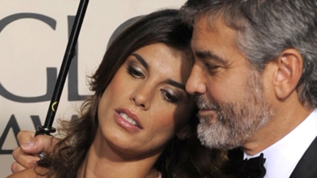 Investment pays off ... Elisabetta Canalis accompanies George Clooney to this year's Golden Globe awards.