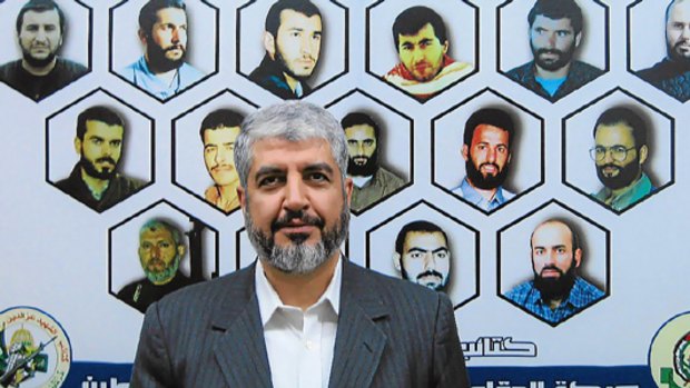 In his office, Hamas leader Khalid Meshaal has a mural depicting the faces of 20 Hamas leaders fighters and bomb-makers who were assassinated.