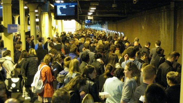 People crowd the platform at Flinders Street Station about 6pm Wednesday.