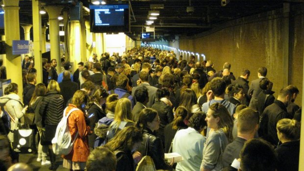 People crowd the platform at Flinders Street station about 6pm Wednesday.