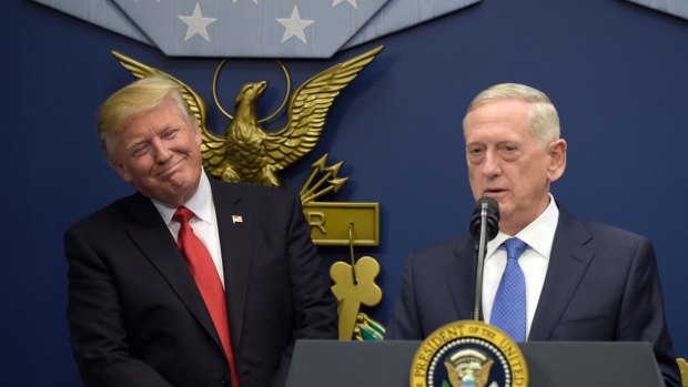 President Donald Trump (left) listens as Defence Secretary James Mattis speaks at the Pentagon in Washington, Friday, January 27, 2017. 