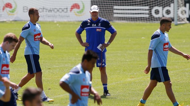 Mind games: Sydney FC coach Graham Arnold oversees a training session on Thursday.