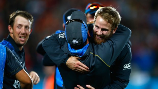 Kane Williamson and Luke Ronchi celebrate after their semi final win against South Africa.