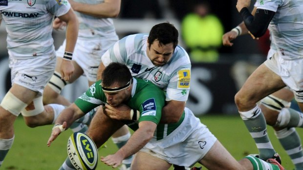 Recruit: Jamie Hagan, seen here tackling Grant Shiells while turning out for London Irish, has signed with the Rebels.