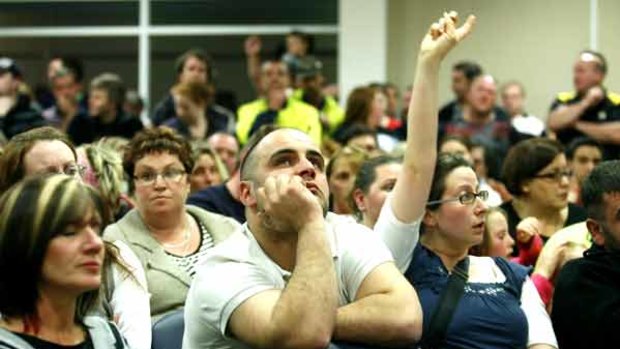 Angry Brookland Greens residents attend a public meeting last night.
