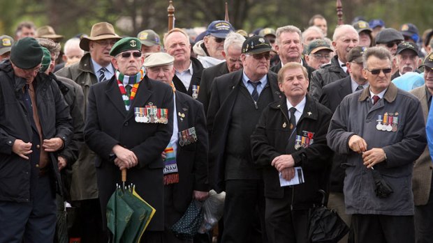 Vietnam veterans weathered the elements at the Shrine of Remembrance, joking that at least it wasn't gunfire.