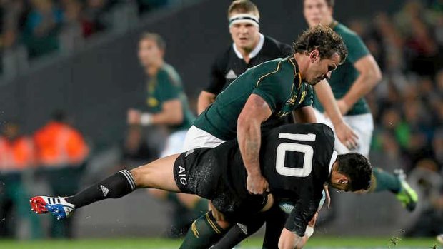 The IRB says Bismarck Du Plessis of South Africa was mistakenly given a yellow card for this tackle on Dan Carter.