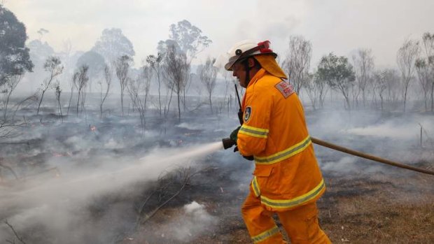 The fire was approaching homes near Austral.