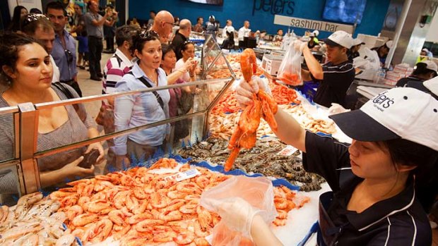 Fruits of the sea: Good Friday is the busiest day of the year at Sydney Fish Market, pictured, but religion is no longer the reason people are choosing seafood.
