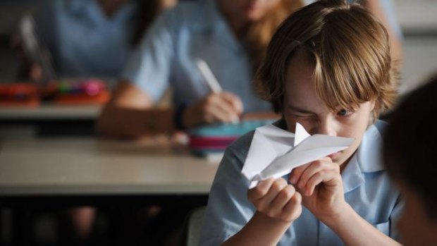 Folding future: Ed Oxenbould as Dylan, an 11-year-old who discovers he has a knack with the folding stuff, in <i>Paper Planes</i>.