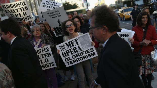 Protesters, many of them Jewish activists, demonstrate as people arrive for the opening night of the Metropolitan Opera season at the Lincoln Centre.