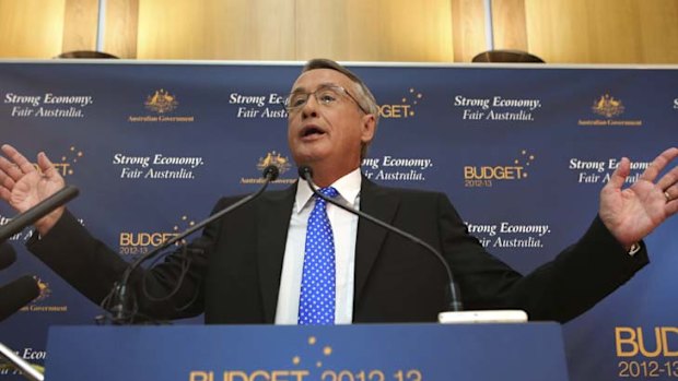 ''A Labor budget to its bootstraps'' ... Wayne Swan speaks at the budget lock-up yesterday.