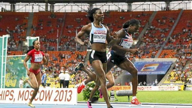 Christine Ohuruogu (R) wins the gold medal.