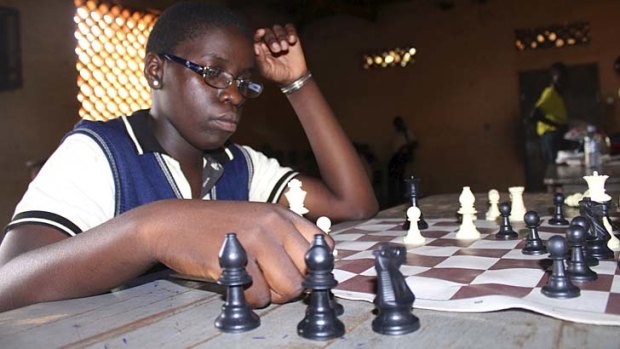 Food for the brain: Chess champion Phiona Mutesi plans her next move.