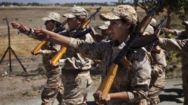 Quick march: Female Peshmerga recruits in Sulaimaniya.