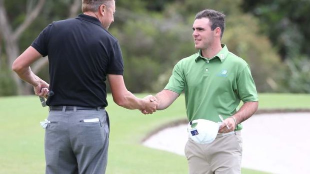 Amateur in name only: Anthony Murdaca shakes hands with Robert Allenby on Saturday.