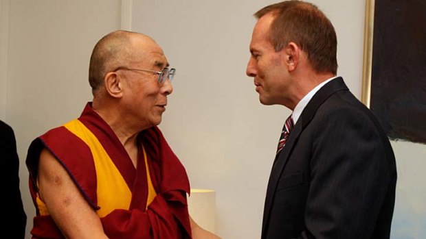 The Dalai Lama meets Opposition Leader Tony Abbott at Parliament House in Canberra.